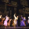 Actors Jim Walton (C) & Clare Leach (3R) w. cast in a scene fr. the National tour of the Broadway musical "42nd Street."