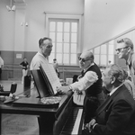 (L-2R) Choreographer George Balanchine and composer Igor Stravinsky with pianist Nicholas Kopeikine at rehearsal of New York City Ballet production of "Agon" (New York)