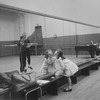 Marina Eglevsky watching in mirror while her father, dancer Andre Eglevsky and Maria Tallchief rehearse for New York City Ballet production of "Gounod Symphony", choreography by George Balanchine (New York)