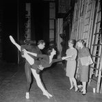 New York City Ballet - Labanotation director Ann Hutchinson (2R) shows system to dancers Judith Green and Nicholas Magallanes, at right is unidentified (New York)