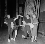 New York City Ballet - Labanotation director Ann Hutchinson (R) shows system to dancers Judith Green and Nicholas Magallanes with Michael Lland (2R) assisting (New York)