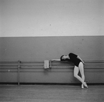 New York City Ballet dancer Leslie Ruchala resting at barre (New York)