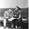 New York City Ballet rehearsal of "Agon" with George and pianist Nicholas Kopeikine looking at score, choreography by George Balanchine (New York)