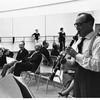 New York City Ballet rehearsal of "Clarinade" with George Balanchine, composer Morton Gould seated and clarinetist Benny Goodman, choreography by George Balanchine (New York)