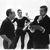 New York City Ballet Company class with George Balanchine and John Taras consulting schedule, Gloria Govrin watching (New York)