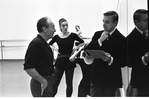 New York City Ballet Company class with George Balanchine and John Taras consulting schedule, Gloria Govrin watching (New York)