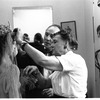 Suzanne Farrell, George Balanchine, and costume designer Barbara Karinska in a costume fitting for "Don Quixote"