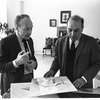 Designer Esteban Francés and choreographer George Balanchine consulting sketches for "Don Quixote"