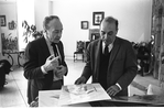 Designer Esteban Francés and choreographer George Balanchine consulting sketches for "Don Quixote"