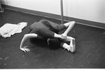 New York City Ballet rehearsal for "Jeux" with Allegra Kent stretching, choreography by John Taras (New York)