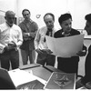 New York City Ballet rehearsal room, Jerome Robbins, Edward Bigelow, George Balanchine and costumer Barbara Karinska looking at Nicholas Benois' sketches for "Theme and variations", choreography by George Balanchine (New York)