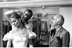 Karin von Aroldingen, hairdresser James Brusock, and George Balanchine in a costume fitting for "Vienna Waltzes"