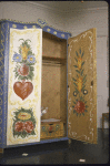 New York City Ballet photograph of Balanchine's cat Mourka in a  cabinet  designed and painted by George Balanchine (New York)