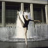 New York City Ballet dancer Patricia Neary poses in front of fountain at the newly built State Theater at Lincoln Center (New York)