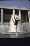 New York City Ballet dancer Patricia Neary poses in front of fountain at the newly built State Theater at Lincoln Center (New York)