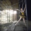 New York City Ballet dancer Violette Verdy poses in front of  the construction of the new Saratoga Performing Arts Center (Saratoga)