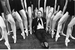 New York City Ballet Master George Balanchine with dancers legs (New York)