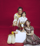 Studio portrait of Jacques d'Amboise and son Christopher, twin daughters Catherine and Charlotte all in costume for a New York City Ballet production of "The Nutcracker." (New York)