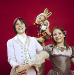 Studio portrait of  Christopher, twins  Charlotte and Catherine (bunny) d'Amboise,  all in costume for a New York City Ballet production of "The Nutcracker." (New York)