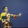 Martha Graham poses with flowers