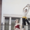 New York City Ballet - Publicity photo Patricia McBride and Edward Villella in front of the unfinished New York State Theater at Lincoln Center, in "Tarantella" costume, choreography by George Balanchine (New York)