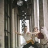 New York City Ballet - Publicity photo Patricia McBride and Edward Villella on the balcony of the unfinished New York State Theater at Lincoln Center, in "Tarantella" costume, choreography by George Balanchine (New York)