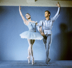 New York City  Ballet  - Publicity photo Patricia Wilde and Andre Prokovsky in "Raymonda" posing in front of fountain in plaza at Lincoln Center, choreography by George Balanchine (New York)