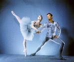 New York City  Ballet  - Publicity photo Patricia Wilde and Andre Prokovsky in "Raymonda" posing in front of fountain in plaza at Lincoln Center, choreography by George Balanchine (New York)