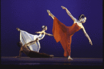 Yuriko Kimura in red and Peggy Lyman in white, Mario Delamo on floor, in a Martha Graham production of "Diversion of Angels" (New York)