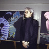Artist Andy Warhol with painting of choreographer Martha Graham (after Barbara Morgan photographs)