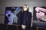 Artist Andy Warhol with painting of choreographer Martha Graham (after Barbara Morgan photographs)