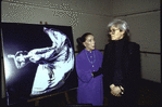 Choreographer Martha Graham and artist Andy Warhol with painting of Martha Graham (after Barbara Morgan photographs)