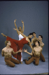 (Seated, L to R) Mark Dendy, Nathan Montoya, Donald Troise, (center, in red) Susan Kikuchi, and others in a studio portrait of the Martha Graham Student Company's production of Graham's "Diversion of Angels"