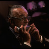 Musician Larry Adler playing the harmonica. (New York)