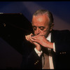 Musician Larry Adler playing the harmonica. (New York)