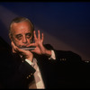 Musician Larry Adler playing the harmonica. (New York)