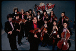 Studio publicity photograph of conductor Marin Alsop (C) with musical group "String Fever" (New York)