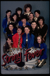 Studio publicity photograph of conductor Marin Alsop (Front 2L) with musical group "String Fever" (New York)