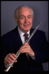 Publicity shot of musician Julian Baker holding flute (New York)