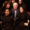 Director Peter Brook on the set of his "La Tragedie de Carmen" at the Brooklyn Academy of Music surrounded by the five singers who sing the role of Carmen (Brooklyn)
