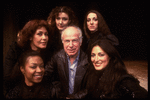 Director Peter Brook on the set of his "La Tragedie de Carmen" at the Brooklyn Academy of Music surrounded by the five singers who sing the role of Carmen (Brooklyn)