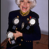 Actress Carol Channing holding Antoinette Perry (Tony) Awards in publicity photo for tour of musical "Hello, Dolly" (New York)