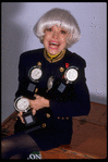 Actress Carol Channing holding Antoinette Perry (Tony) Awards in publicity photo for tour of musical "Hello, Dolly" (New York)