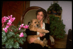 Dancer/choreographer/director Martha Clarke with pet dog at home (New York)