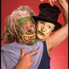 Publicity shot of performer Fred Curchack wearing mask in theater piece "The Stuff That Dreams Are Made Of" at the Brooklyn Academy of Music (New York)