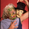 Publicity shot of performer Fred Curchack wearing mask in theater piece "The Stuff That Dreams Are Made Of" at the Brooklyn Academy of Music (New York)
