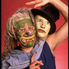 Publicity shot of performer Fred Curchack wearing mask in theater piece "The Stuff That Dreams Are Made Of" at the Brooklyn Academy of Music (New York)