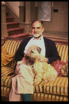 Playwright Larry Kramer with pet dog on the set of his play "Just Say No" (New York)