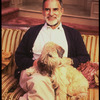 Playwright Larry Kramer with pet dog on the set of his play "Just Say No" (New York)