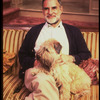 Playwright Larry Kramer with pet dog on the set of his play "Just Say No" (New York)